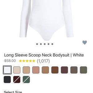 Nuuds white long sleeve scoop neck bodysuit. Size Medium.